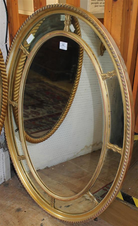 Large oval gilt mirror